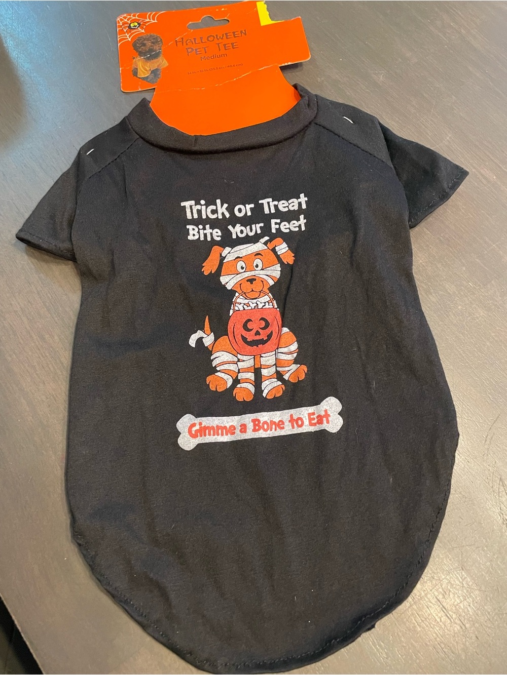 "Trick or Treat Bite Your Feet" pet tee in size medium NWT